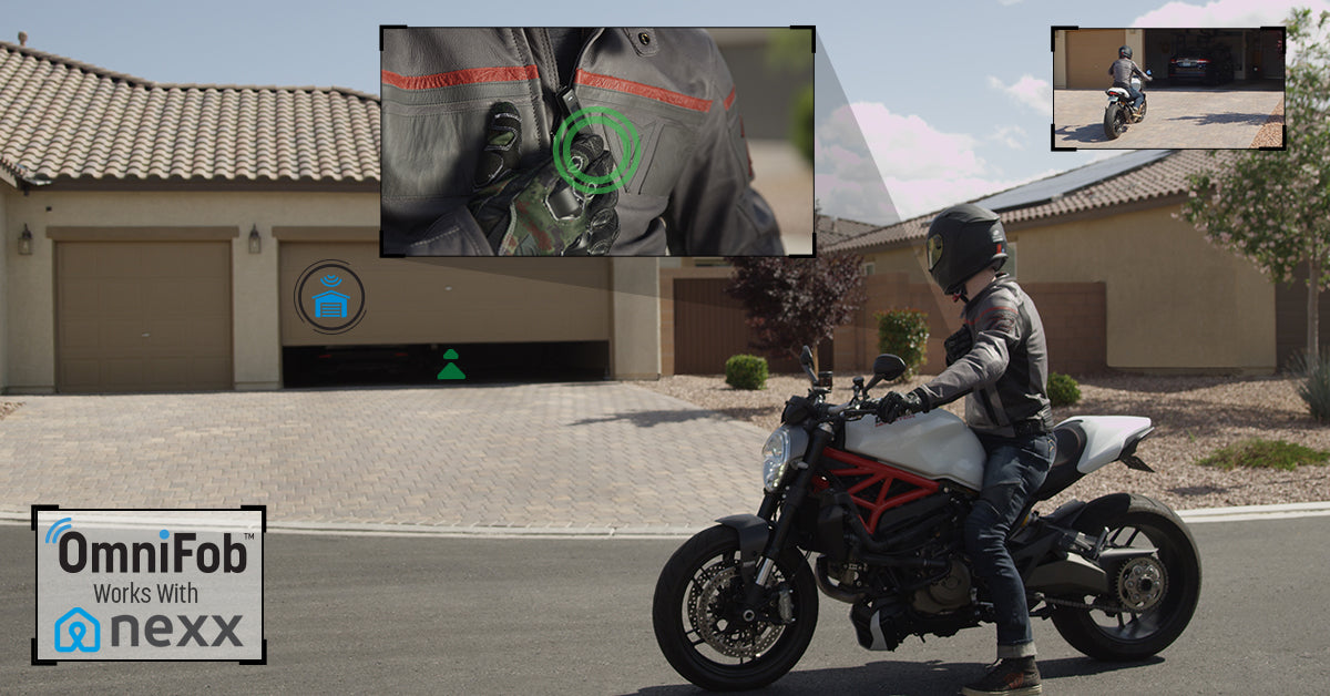 Motorcyclist opening a Nexx smart garage door with a Keyport OmniFob smart key fob on his keychain