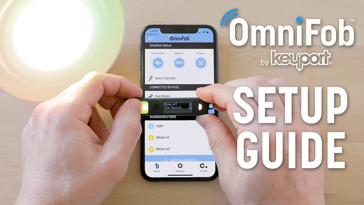 Keyport OmniFob setup guide: pairing an OmniFob smart key fob with the Keyport app beside a smart light