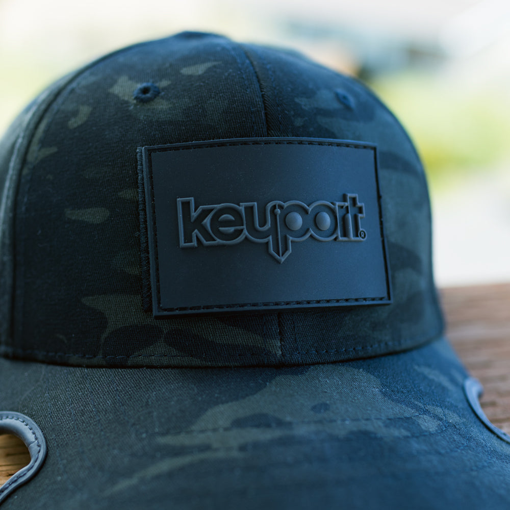 Dark grey on black 2x3 hook & loop Keyport logo tactical morale patch on Notch cap