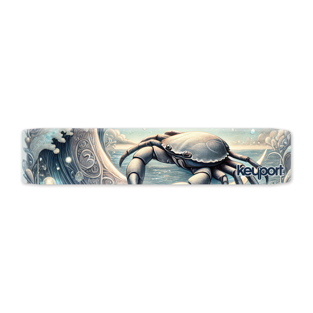 Keyport Cancer Zodiac Faceplate: silver crab on a pale shoreline beneath a carved curling wave with pearls