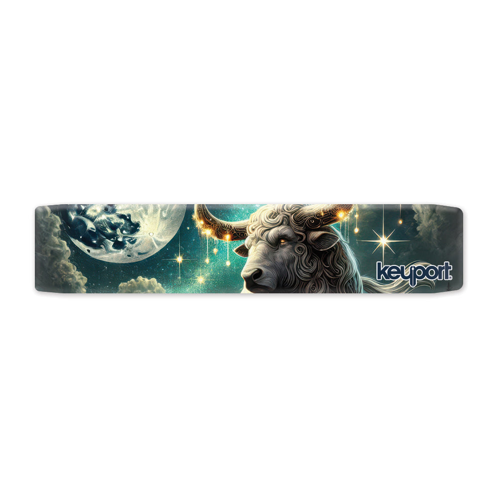 Keyport Taurus Zodiac Faceplate: curly-coated bull with gold-banded horns under a full moon in a teal starry sky