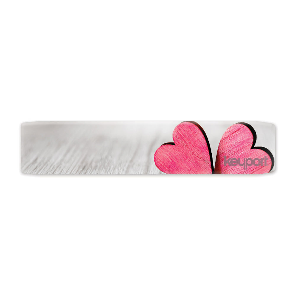 Keyport Faceplate with two intertwined hearts design