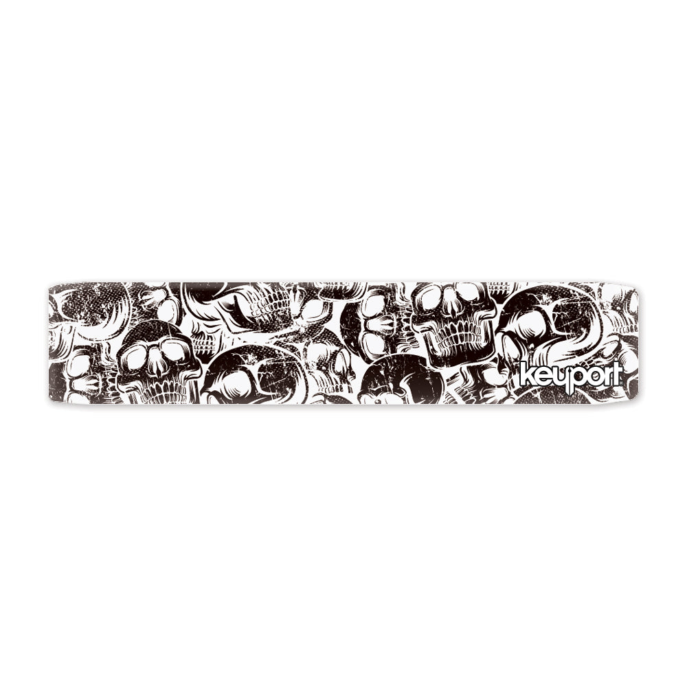 Keyport Faceplate with a light grunge skulls design