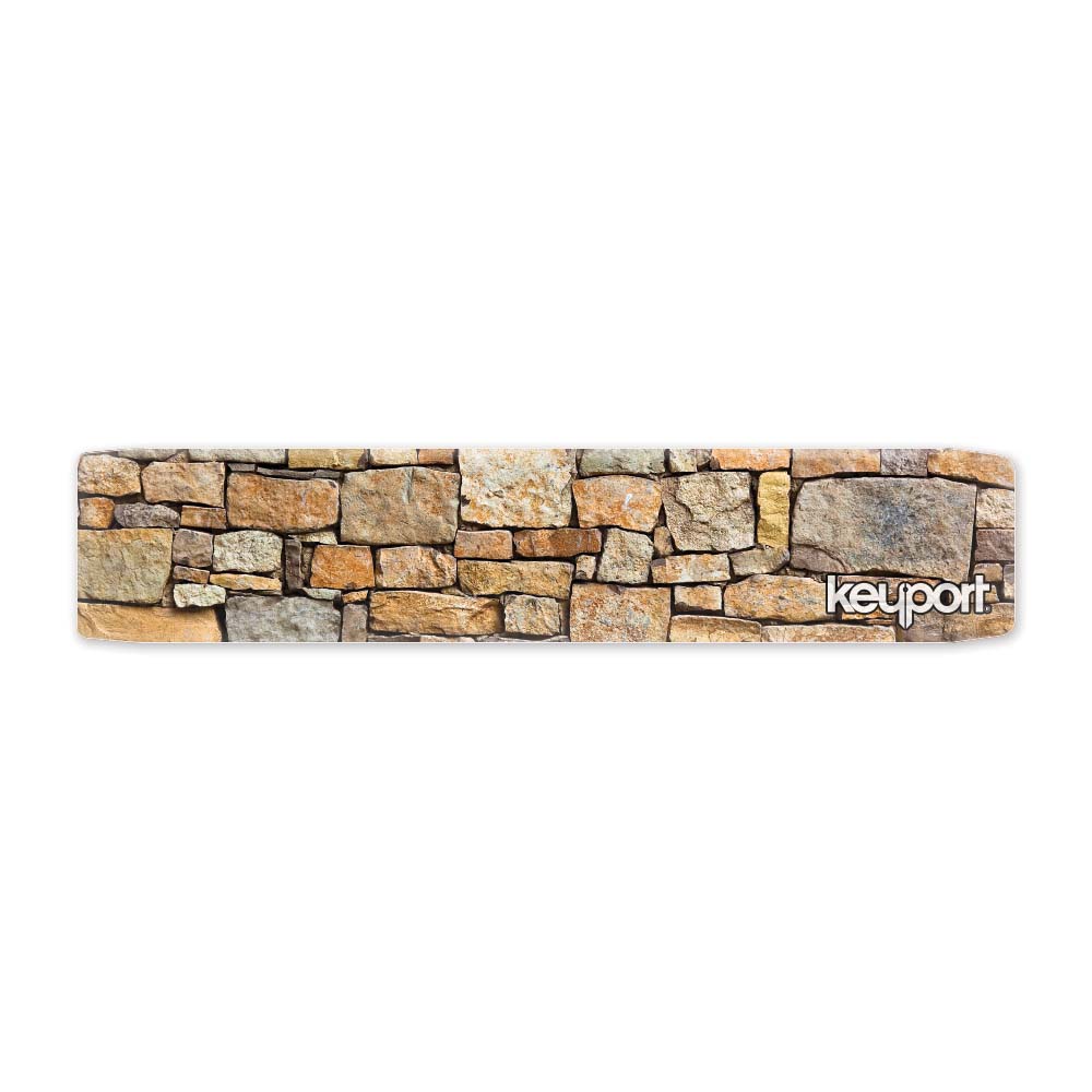 Keyport Faceplate with a rocky wall design, featuring rugged stone patterns