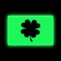 Embrite BEACON patch by TEC Accessories glowing green with a black four-leaf clover graphic