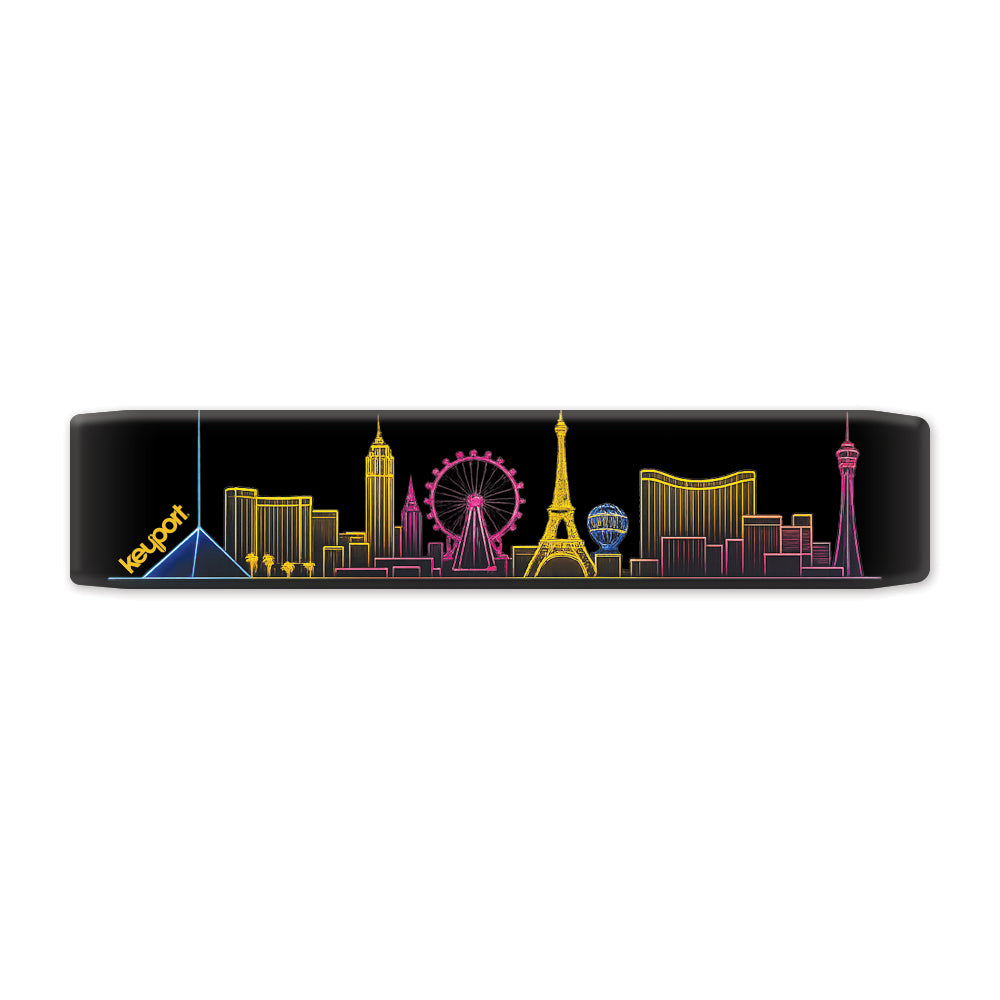 Las Vegas Skyline Faceplate Scale featuring neon cityscape silhouette with landmarks in vibrant colors.