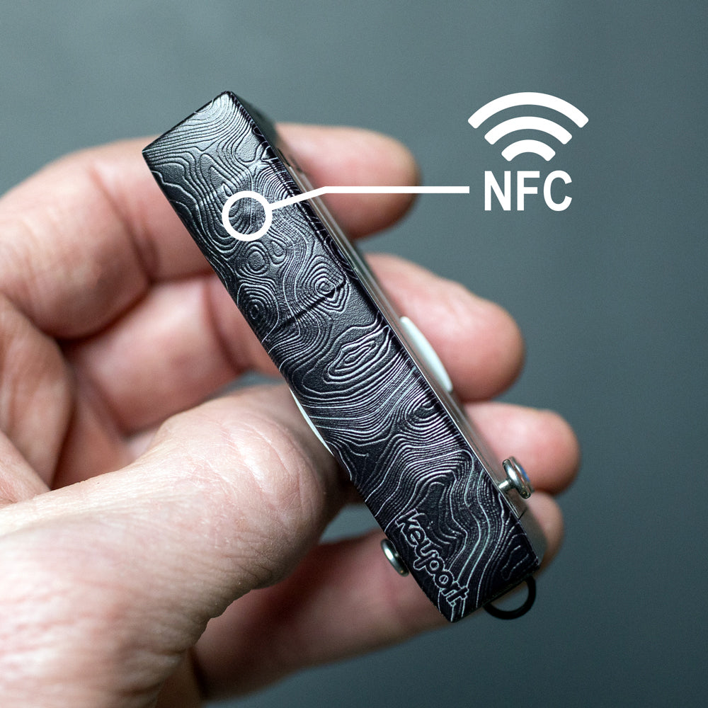 NFC-Enabled Black on Black Topo Faceplate Scale attached to a Keyport Slide