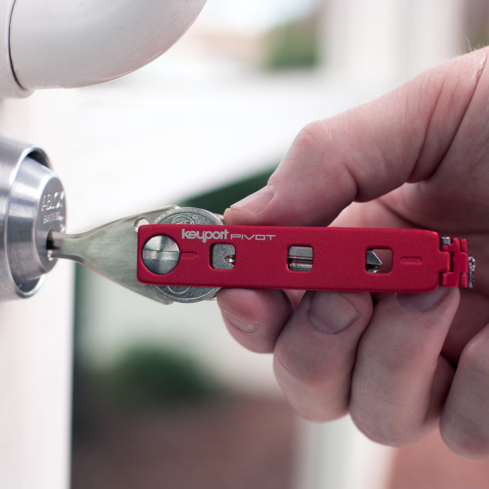Red Keyport Pivot key organizer opens a door