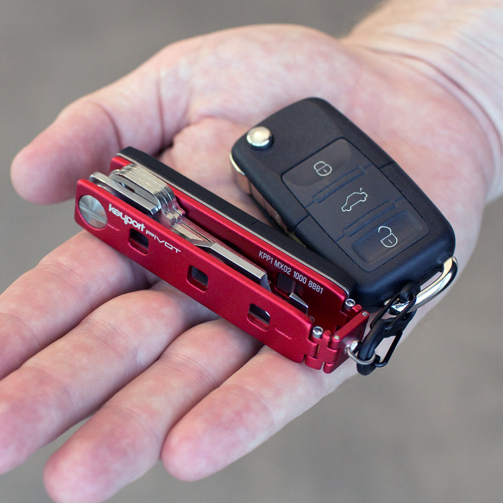 Red Keyport Pivot edc keychain with Pocket Flare and KeyportID lost & found plus auto fob attached via s-biner