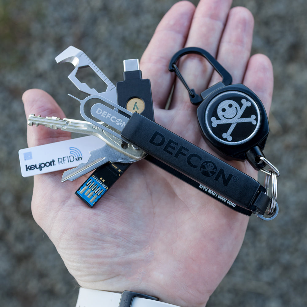 Blackout DEF CON Pivot 2.0 key organizer with keys and tools plus DEFCON Jack Mini-Reel