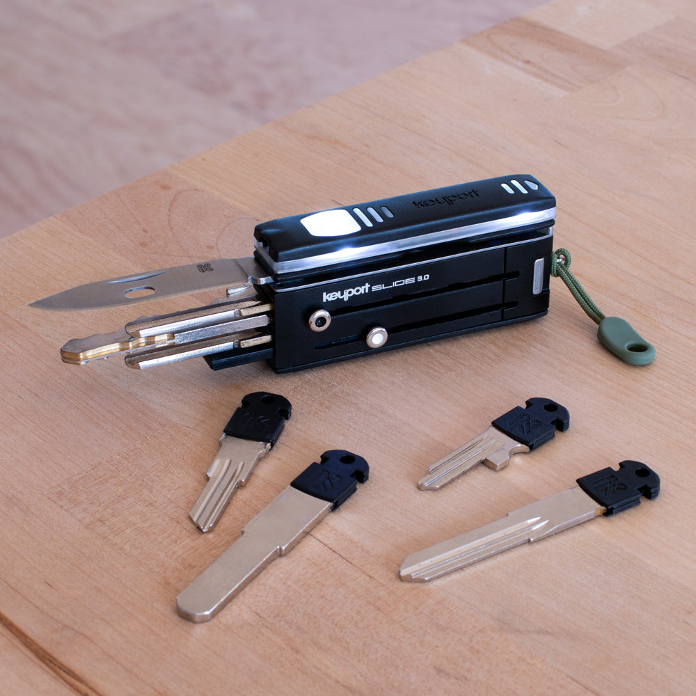 Black 4-port Keyport Slide 3.0 pocket key holder with NEBA Knife and Pocket Flare plus Slide compatible Keyport Key Blades
