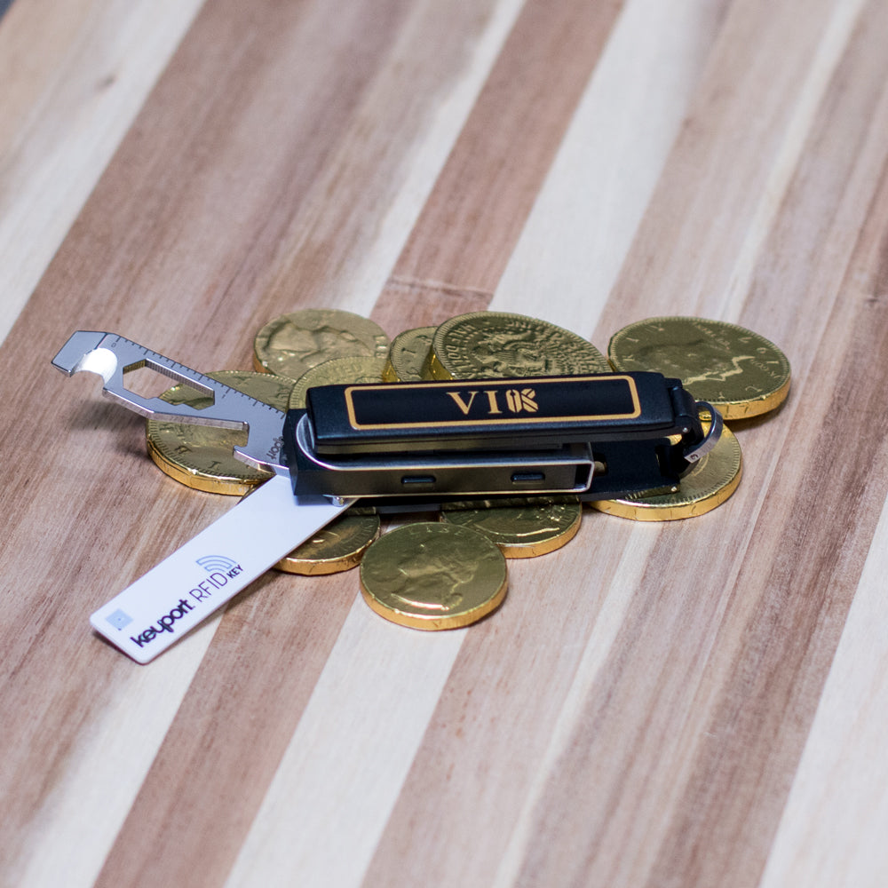 Keyport Faceplate with Very Important Keyporter text and pivot on pouch coins 