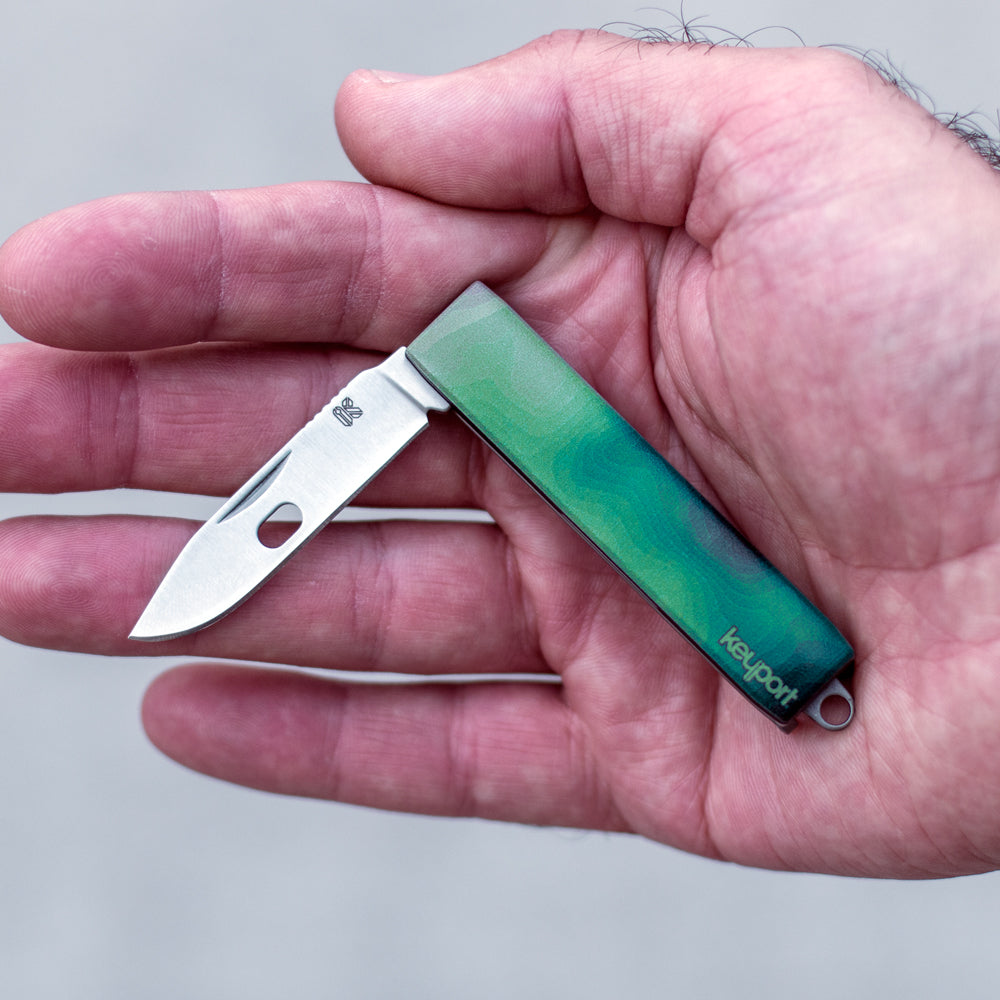 Keyport Faceplate with a water abstract topo knife